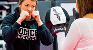 photo - Police Foundations students sparring during a training session