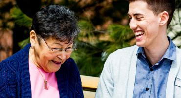 photo - Recreation Therapy student interacting with a senior out for a walk