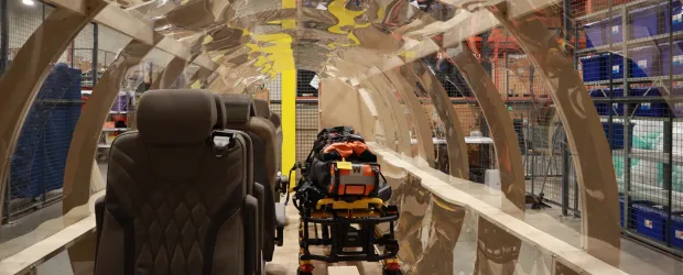 Students testing a PC-24 air ambulance interior mock-up for Ornge medical transport training and workflow design.