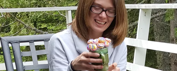 Jennifer accepting some fare-well gifts