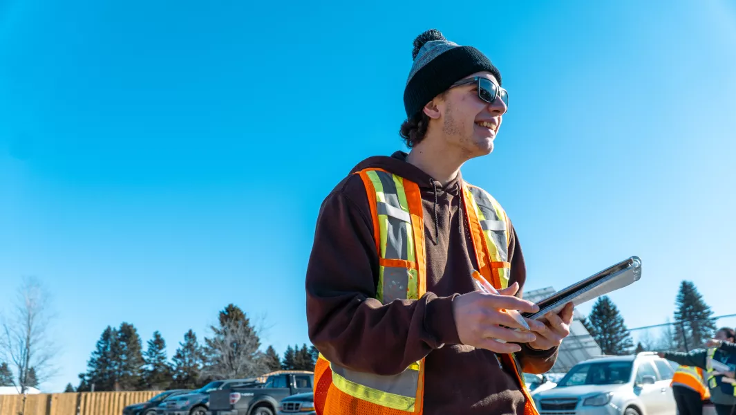 Civil Engineering Technician Student with a notes