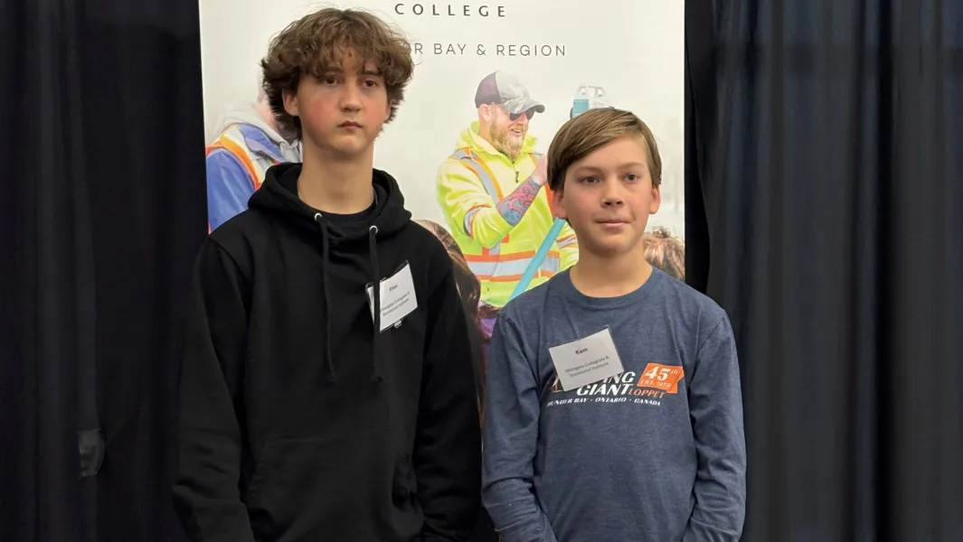 Students posing with backpacks after participating in a Confederation College Dual Credit engineering event