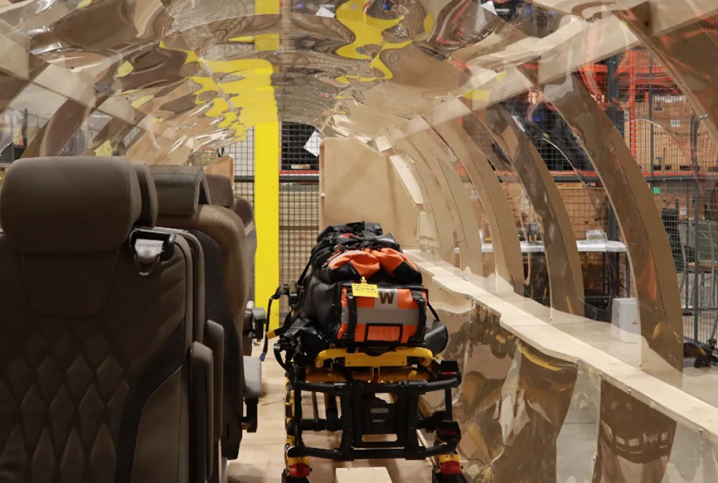Students testing a PC-24 air ambulance interior mock-up for Ornge medical transport training and workflow design.