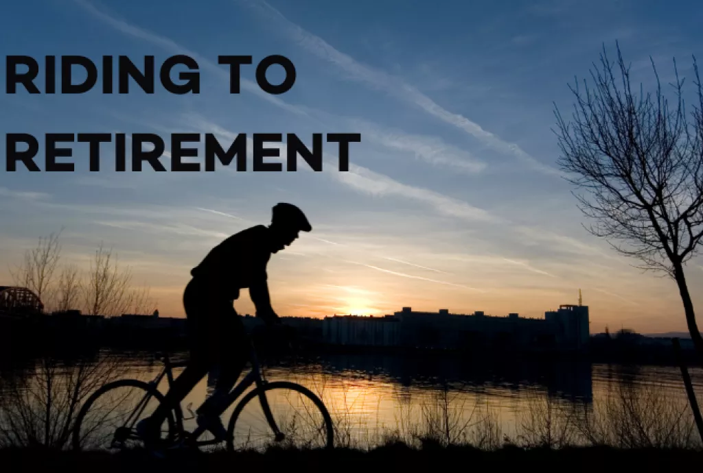 Riding To Retirement - Biker riding on a path