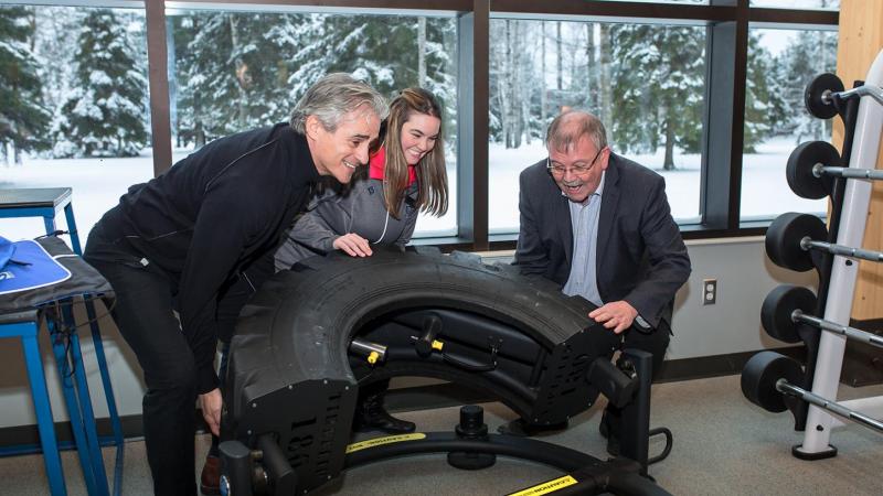 Tire Lift - MPP Bill Mauro, SUCCI President Jodi Afonso and College President Jim Madder
