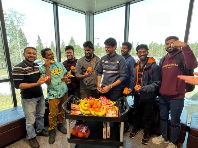 Students standing in front of nutritious snack cart